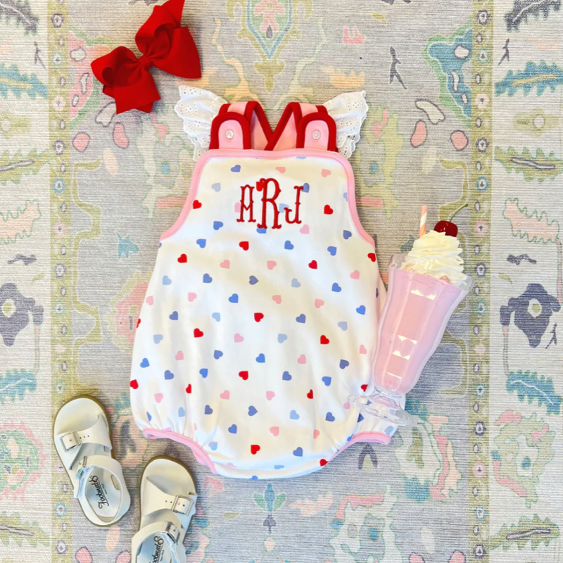 saylor sunsuit in happy hearts