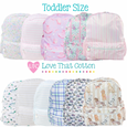 Collection of toddler-sized backpacks with various patterns and designs, featuring the brand 'Love That Cotton'.