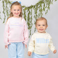 girl and boy roll neck sweaters