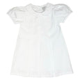 White woven dress with puff sleeves, pleats and peter pan collar